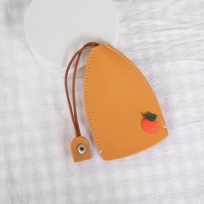 Cartoon pull-out key case in PU leather measuring 14 by 7.5 centimetres