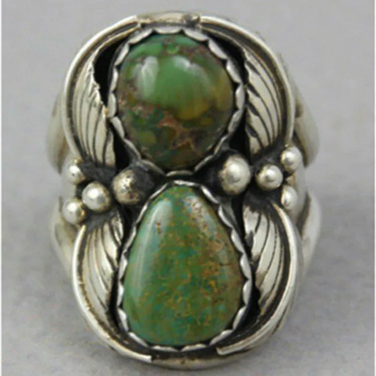 Geometric turquoise women's ring with inlaid detail on alloy band, showing side profile