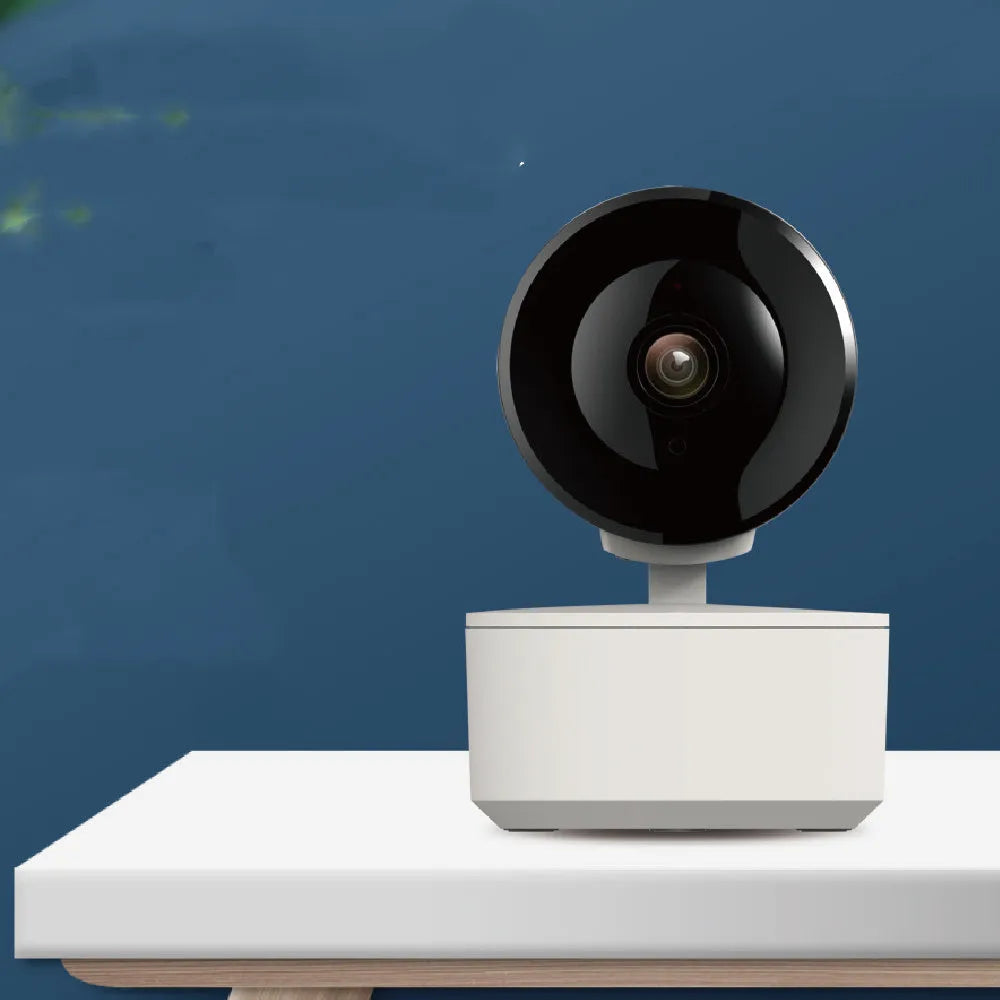 White indoor WiFi security camera with 1080p lens on a swivelling base for PTZ movement.