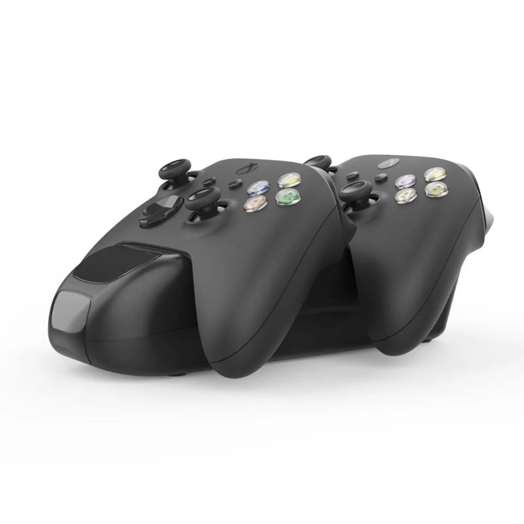 Black Xbox Series X wireless controller dual charging dock with two battery packs on station.