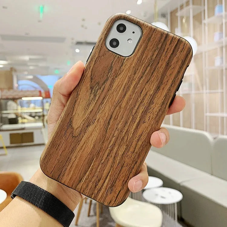Slim wooden bamboo iPhone back cover case for iPhone 11 Pro shown in a teak wood finish.