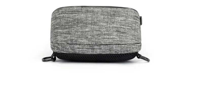 Small dark blue oxford cloth waterproof chest bag with a zipper and car suture detailing.