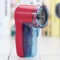 Cordless electric lint remover device for clothing fabric care