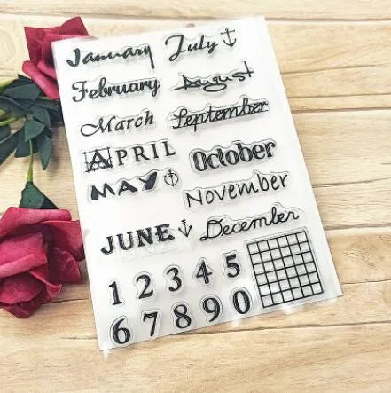 Close-up of a transparent silicone vintage calendar seal stamp showing a digital table icon design.