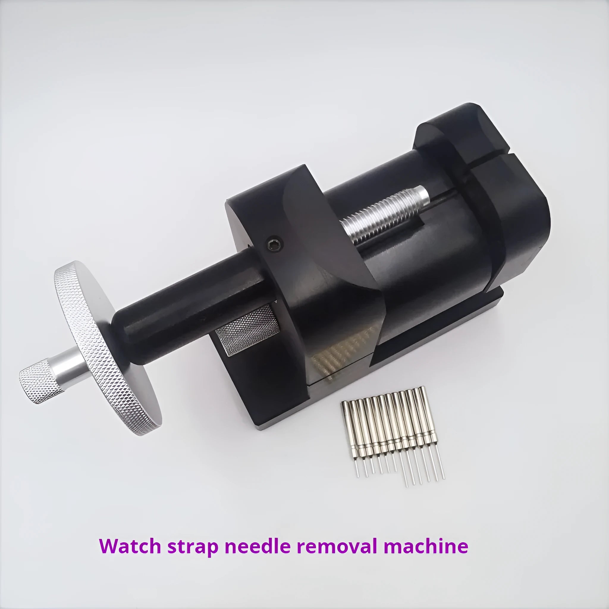 Alloy steel watch strap stripping machine tool on a workbench for watch repair.
