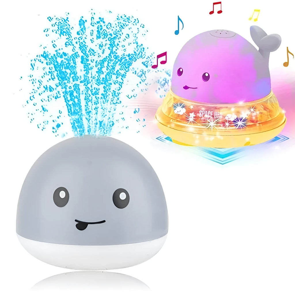 Whale-shaped baby bath toy with automatic water spray and colourful lights floating in water.