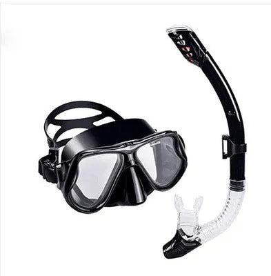 Black anti-fog lens diving goggles with PC frame, silicone strap, and mouthpiece on a blue background.