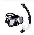 Black anti-fog lens diving goggles with PC frame, silicone strap, and mouthpiece on a blue background.