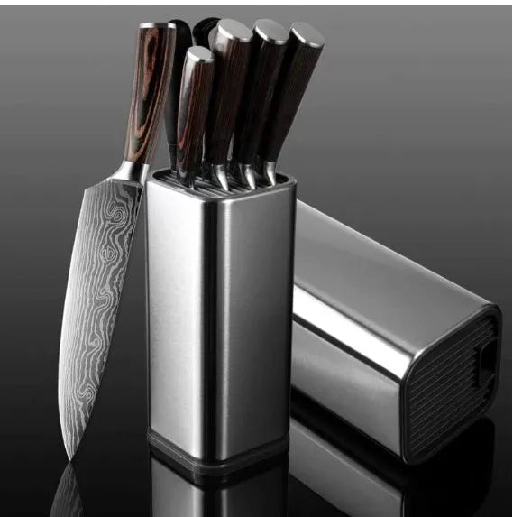 Black and white kitchen knife holder with storage bucket and detachable base on a countertop.