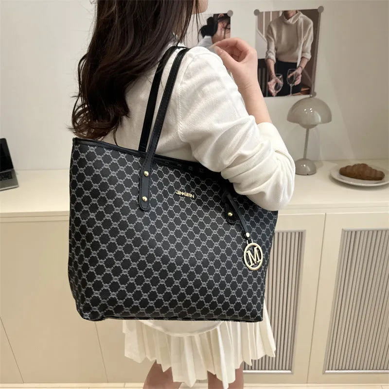 PU leather shoulder bag with adjustable strap in street trend style showing black colour option