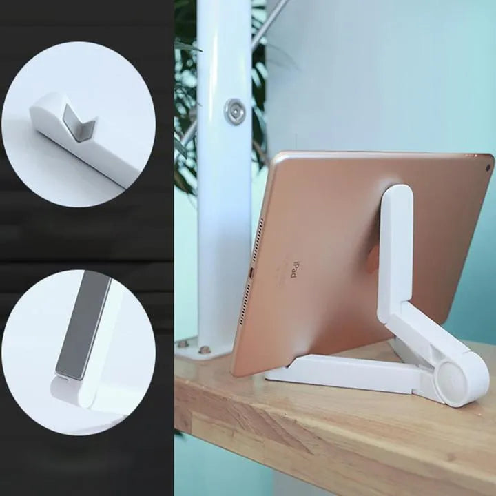 Black foldable tablet holder standing upright with a tablet in landscape mode on a wooden desk