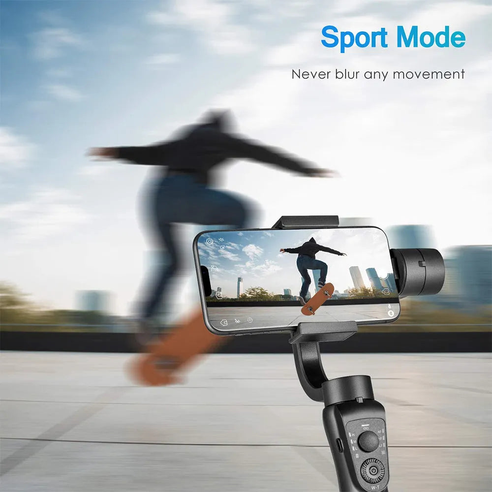 Black three-axis phone gimbal stabilizer with tripod accessory on table