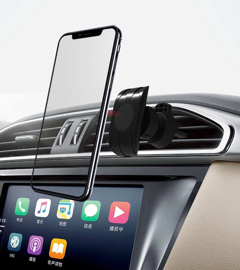Black car phone holder clipped onto vehicle air vent with phone securely mounted