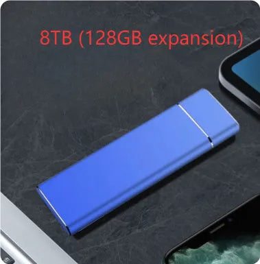 Sapphire blue metal external solid state hard disk with USB cable on a white surface