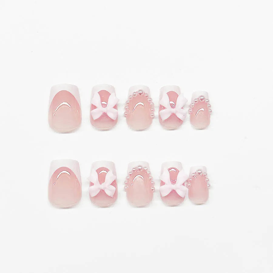 French manicure nail art set with bow, tulip, and starry sky designs on short European square nails