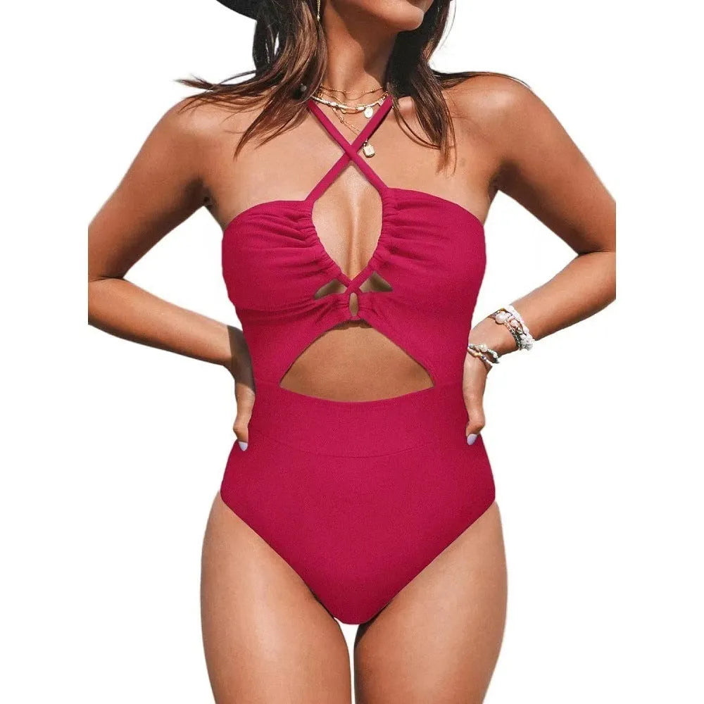 Women's black cross-back one-piece swimsuit with backless design