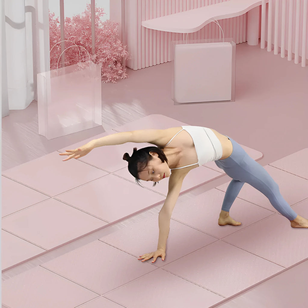Blue folding portable TPE gymnastic mat unfolded on a wooden floor