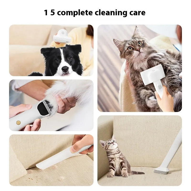 Pink and white pet grooming vacuum cleaner host with attachments including electric shear and combs.