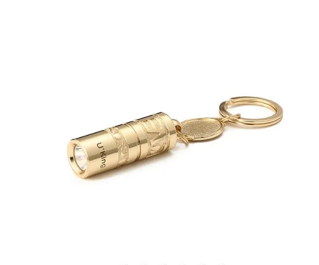 Gold zinc alloy waterproof LED flashlight attached to a key ring