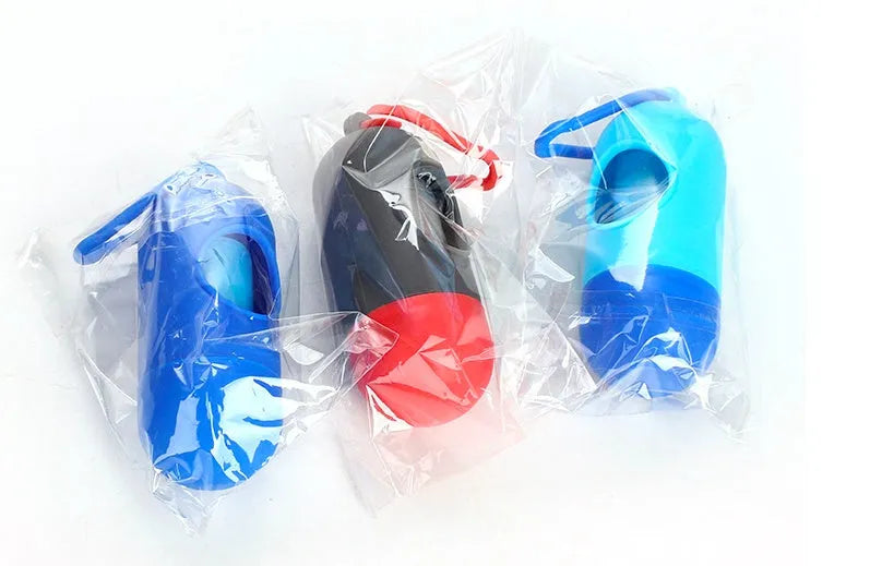 Set of five coloured dog waste poop bags showing black, blue, red, green, pink, and purple options.