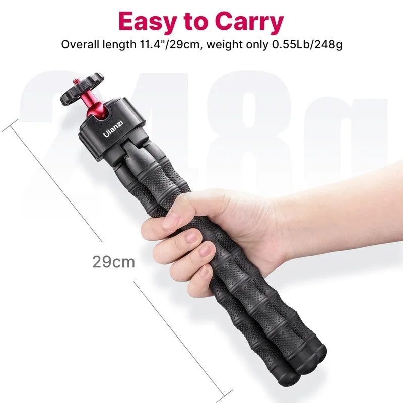 Smartphone mounted on an aluminium tripod with Bluetooth remote and cold shoe adapter for vlogging.