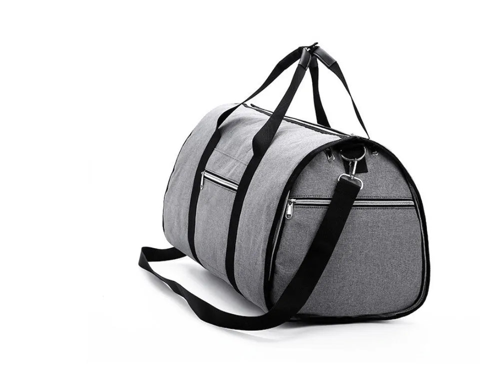 Medium sized cylindrical travel bag in black, made from oxford cloth with a top zipper.