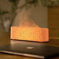 Square black desktop aroma diffuser and humidifier with creative lava flame lighting effect.