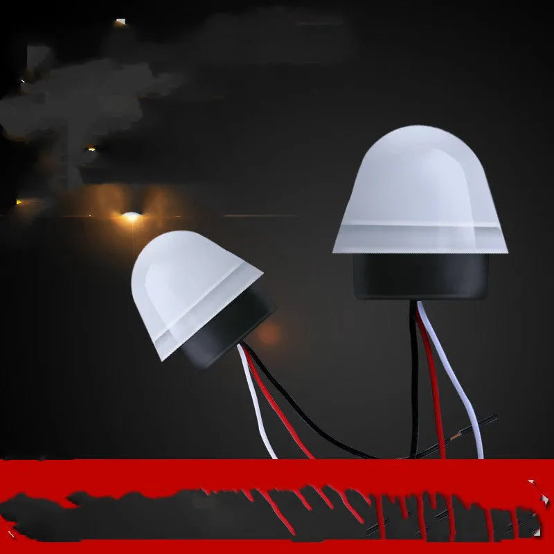 White automatic induction street lamp with sensor for outdoor security lighting.