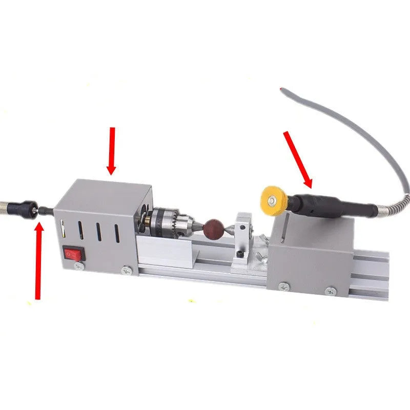 Metal mini woodworking lathe with carving knives and tools for small woodturning projects