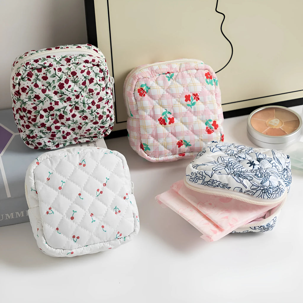 Floral pattern key storage bag made from breathable polyester fabric in various colour options.
