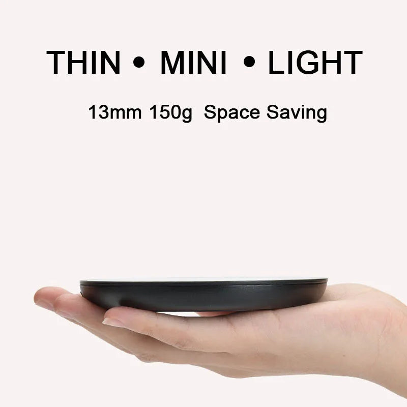 Black coffee cup warmer with 12 cm tempered glass heating surface and ABS plastic base