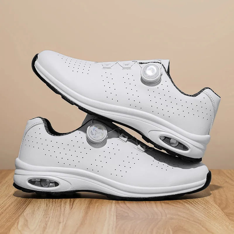 Low top casual tennis shoes in black with mesh upper and composite sole