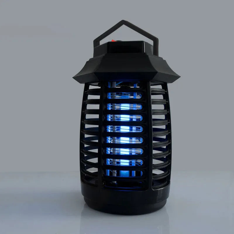 Black aromatherapy mosquito lamp with a visible glass UV tube and metal grid.