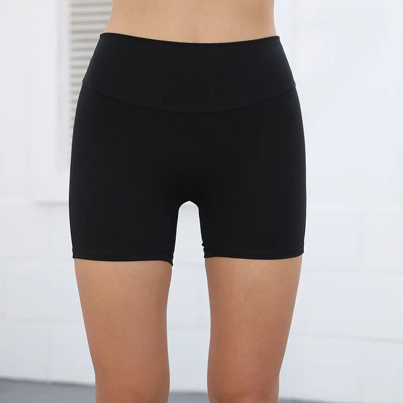 Women's high waist fitness shorts with side pockets in quick-dry nylon fabric