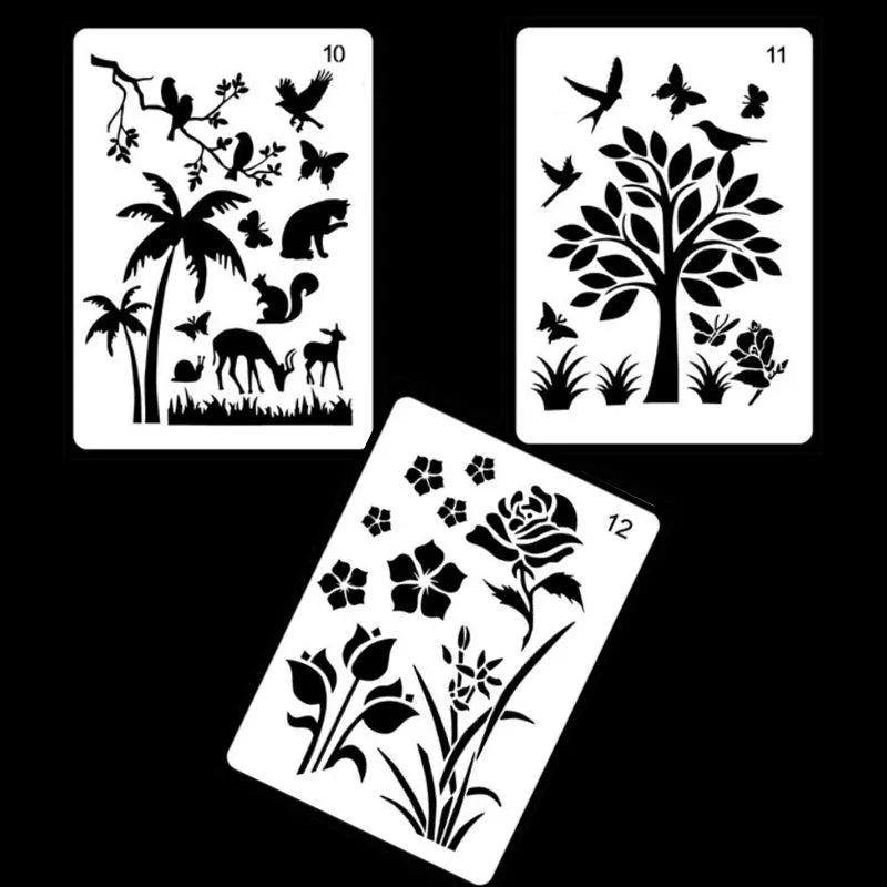 Set of white plastic drawing stencils with assorted cut-out patterns for crafts and decoration.