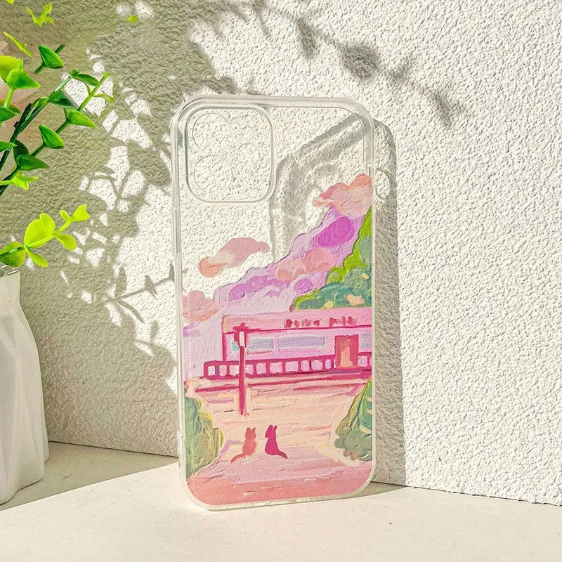 Soft silicone iPhone case with a colourful cartoon print of two cats on the back.