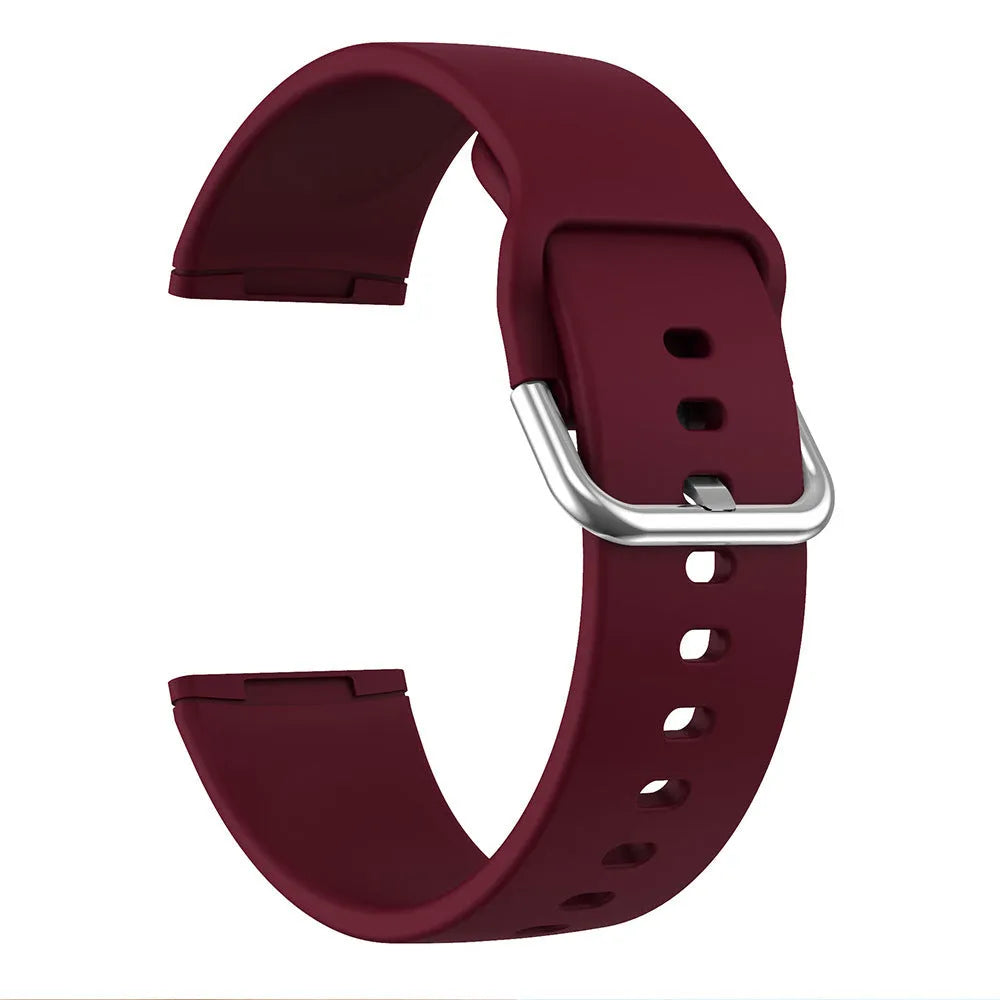 Solid colour silicone replacement strap with silver buckle for Fitbit Versa 3 and Sense 2 smartwatches.