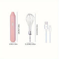 Hand-held wireless electric whisk in black and pink, with straight handle and stainless steel whisk attachment
