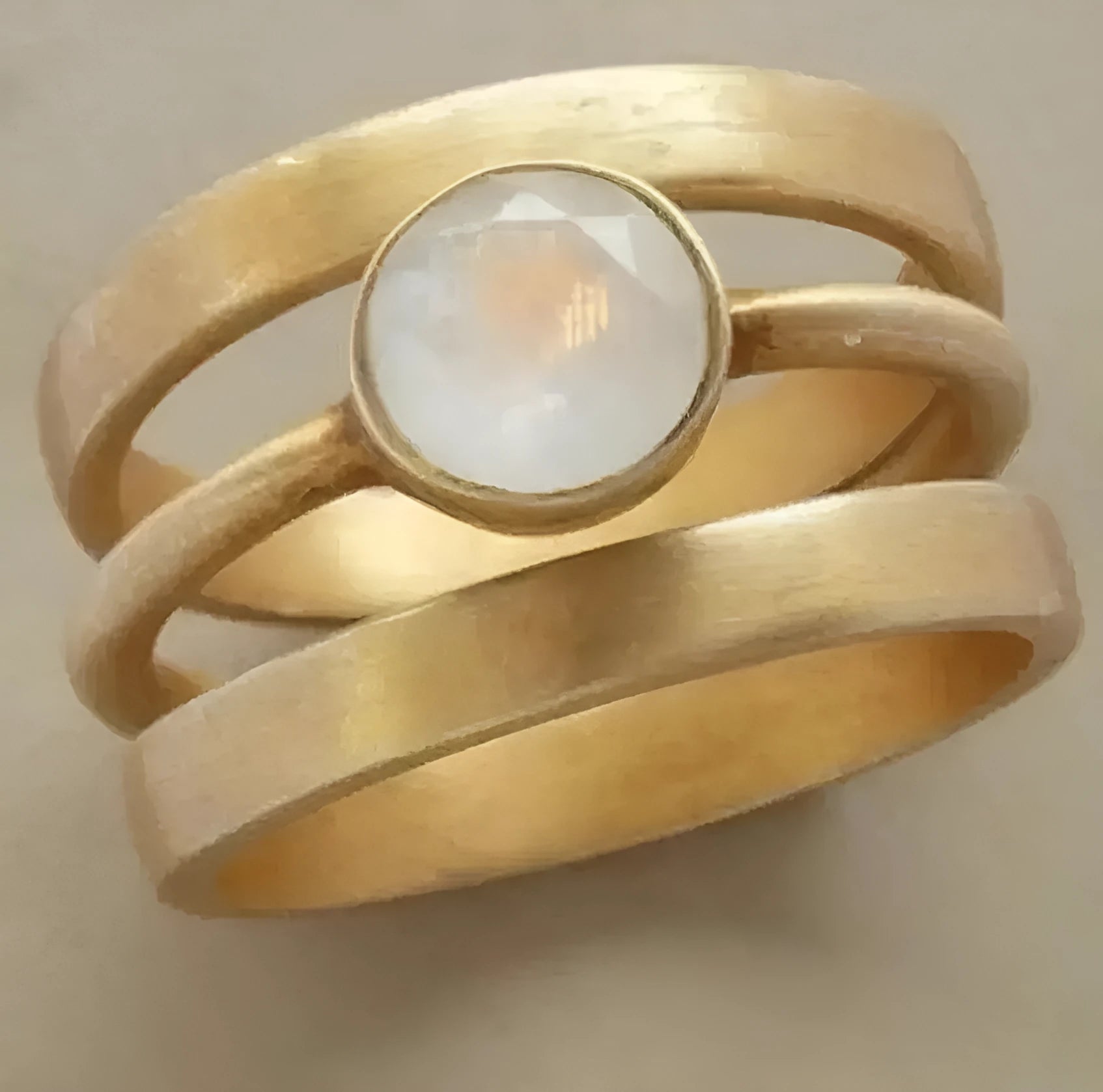 Gold geometric titanium steel ring with hollow design and micro-inlaid white chalcedony elements