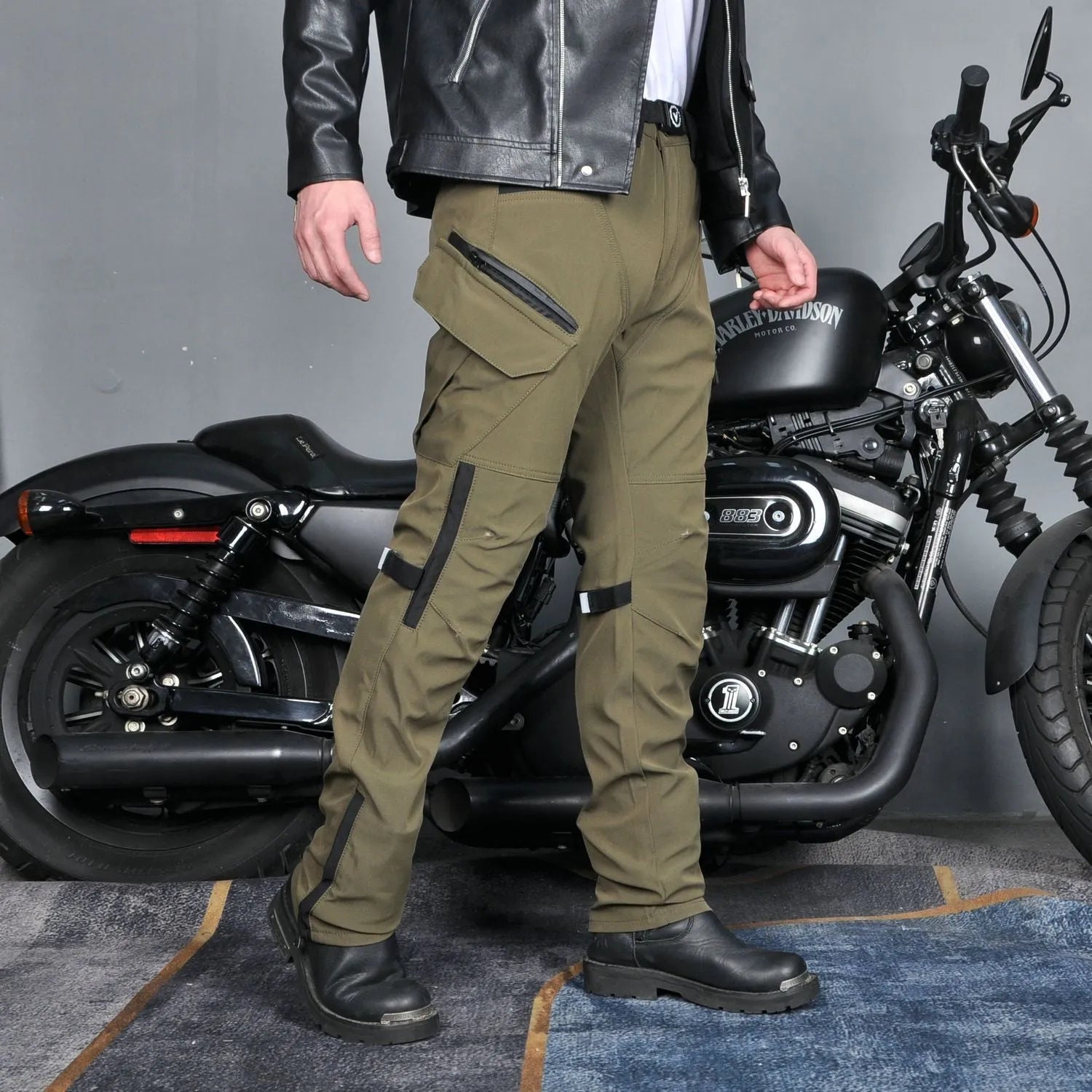 Men's black waterproof motorcycle trousers with protective gear set for cycling