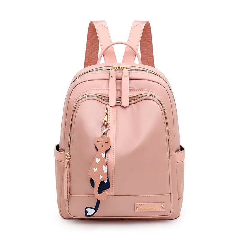 Women's black nylon casual backpack with double shoulder straps and external pockets