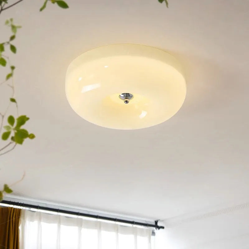 Cream American-style bedroom ceiling lamp with three-colour light mounted centrally