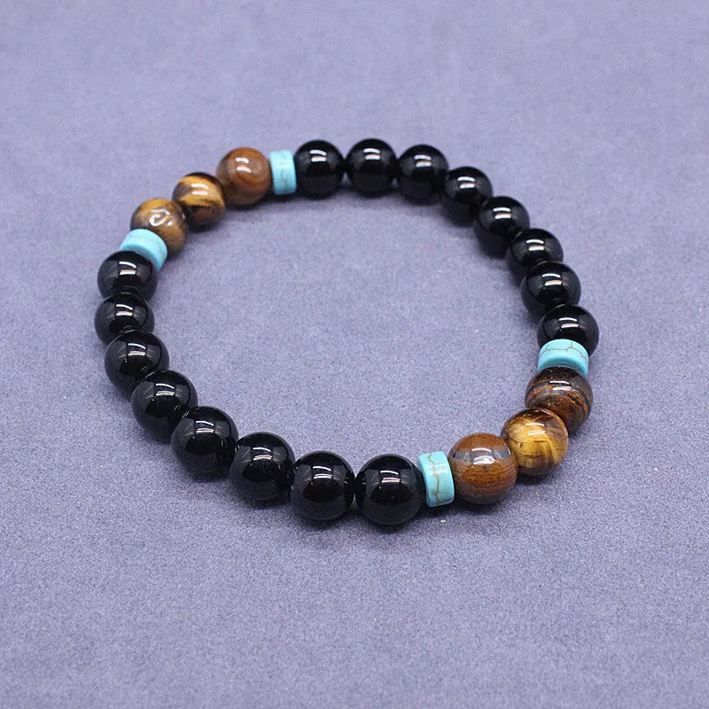Agate and tiger's eye stone jewellery set with black bracelet and tiger-shaped pendant necklace