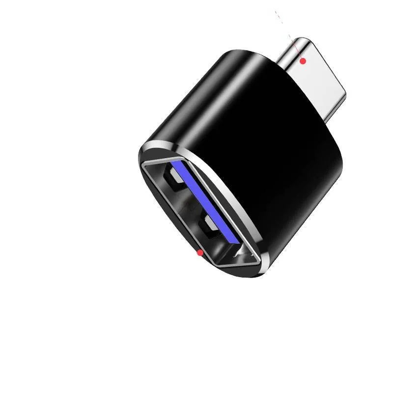 USB Type-C male to USB-A female OTG adapter shown in black, silver, and gold colour options.
