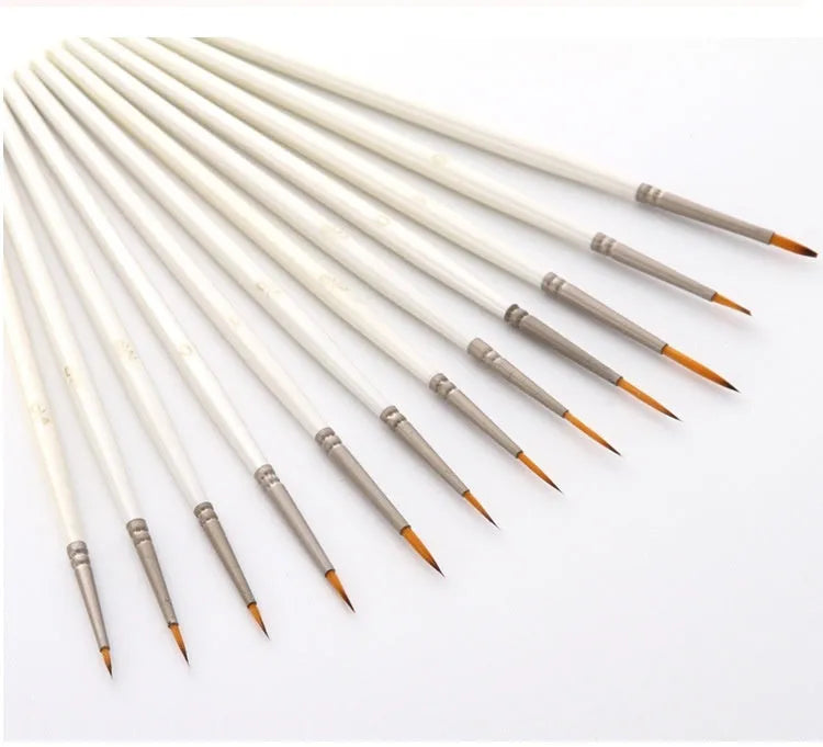 Set of twelve pearl white fluorescent marker pens with nylon wool brush tips and solid wood holders for watercolour art.