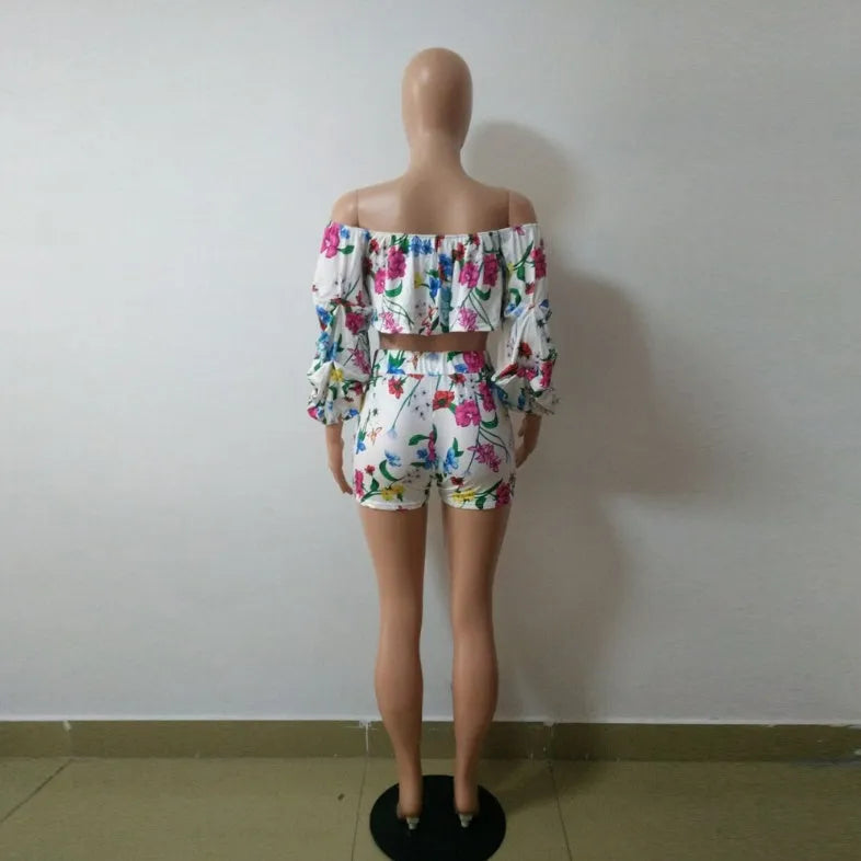 Sexy multicolour digital print two-piece set with long-sleeve pile top and matching shorts.