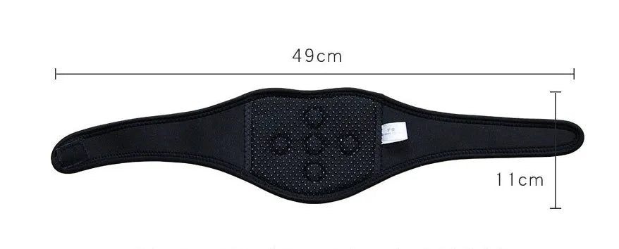 Black self-heating magnetic therapy neck guard with adjustable shoulder strap laid flat.