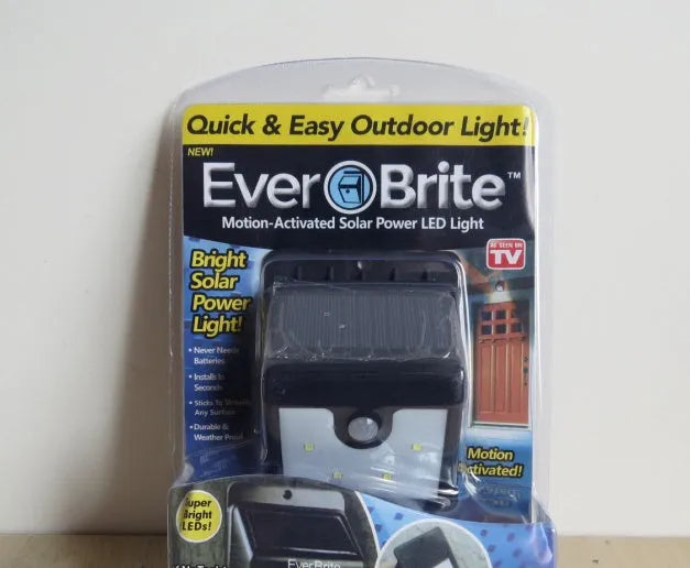 Solar-powered outdoor LED security light with six adjustable panels and stainless steel mounting bracket