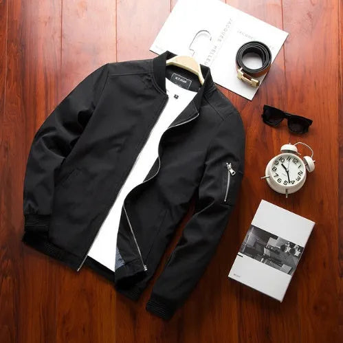 Men's slim fit casual baseball jacket in solid colour with zipper and side pockets.