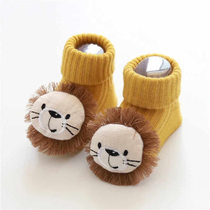 Cotton baby floor socks with non-slip soles in a pink bow print design.